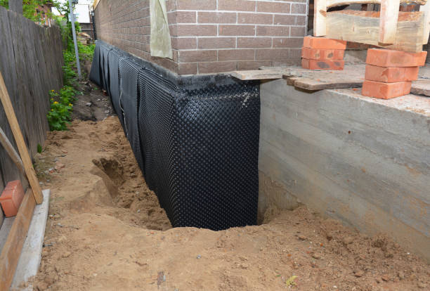 SJ Waterproofing Pros technician performing targeted Foundation Crack Repair assessment in Coldwater, MI